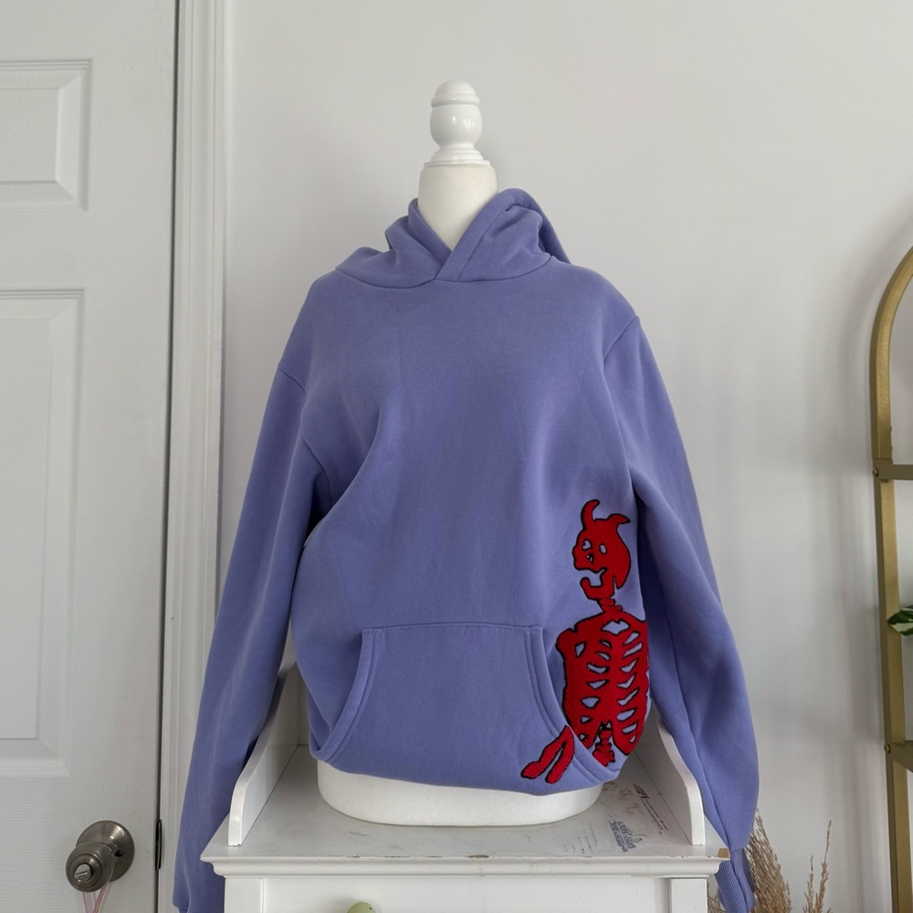 Purple Hoodie with Red Skeleton Design